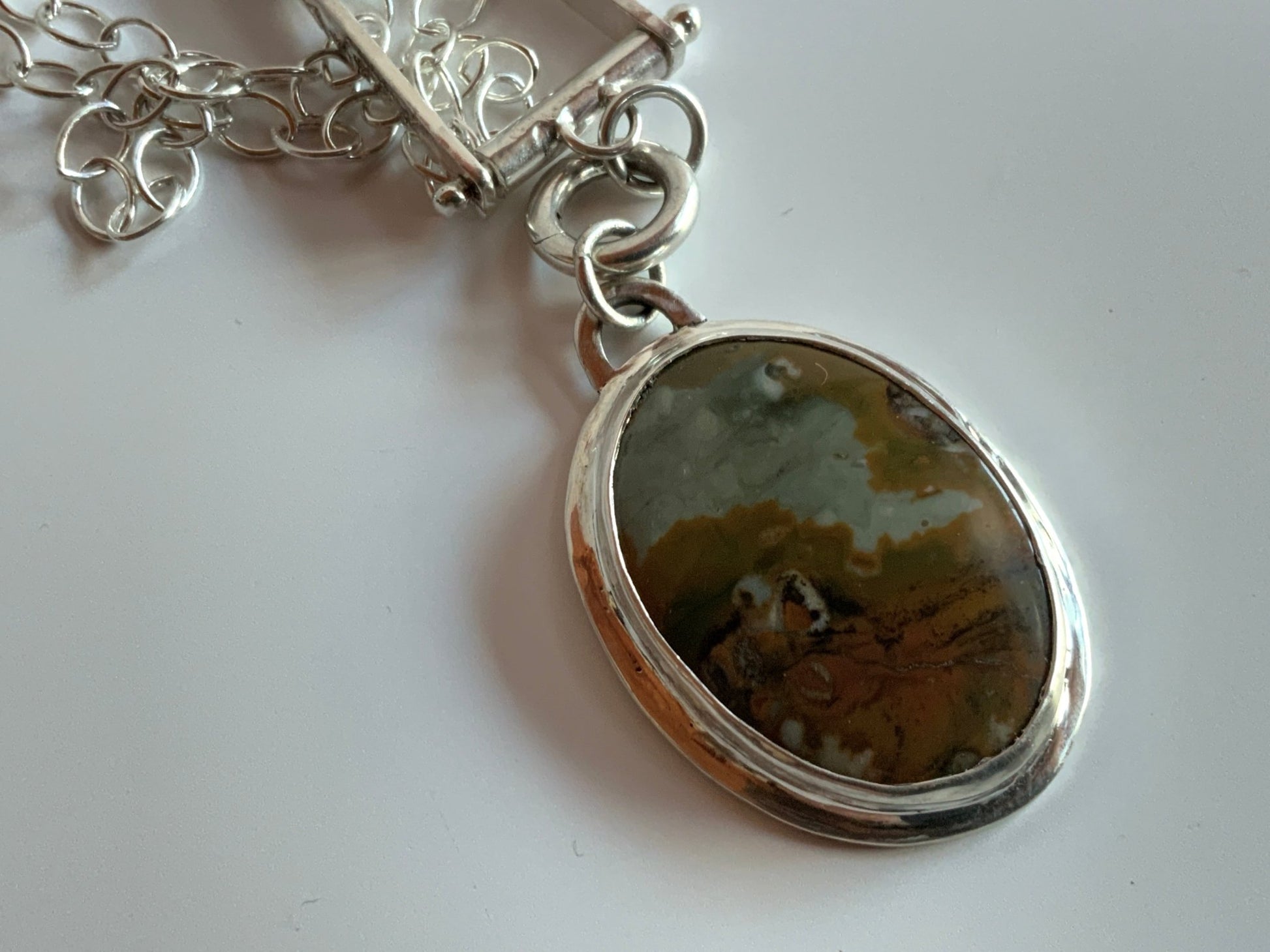 Scenic Jasper pendant on trapeze enhancer - Evitts Creek Arts